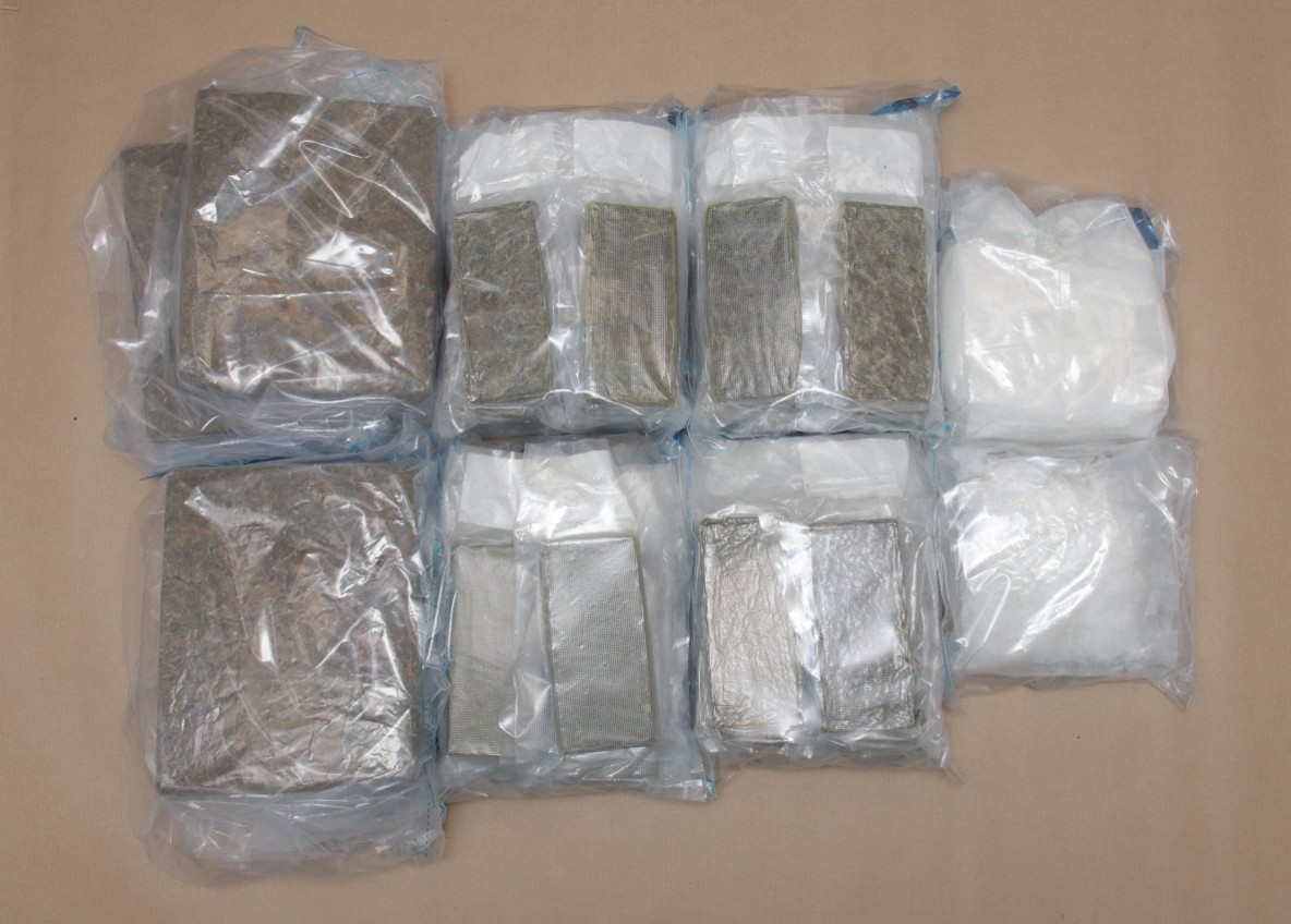 Photo (CNB): Cannabis and Ice seized from the boot of the car driven by the 22-year-old Malaysian man. 