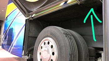 The Malaysia-registered bus with modified compartments above the rear tyres (Photo credit: ICA)
