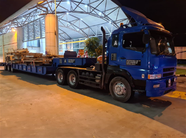 Side view of the lorry carrying duty-unpaid cigarettes detected at Tuas Checkpoint. (Photo: ICA)