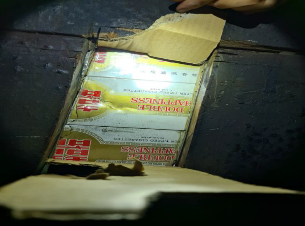 Duty-unpaid cigarettes were found hidden underneath the lorry bed. (Photo: ICA)