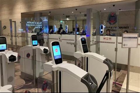 Automated immigration lanes with iris and facial scanning at Changi Airport T4