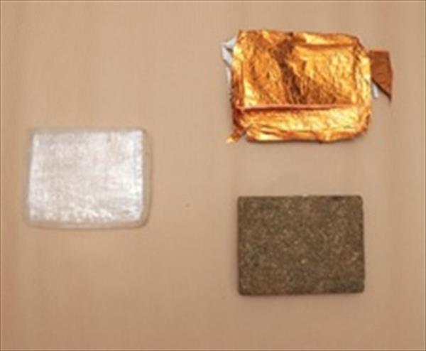 One of the cannabis blocks seized, unwrapped from its packaging