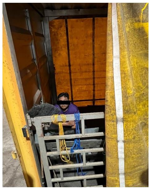 A 32-year-old Malaysian man hiding inside the cargo compartment of the lorry