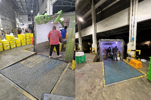 Truck drivers unloading imports for inspection