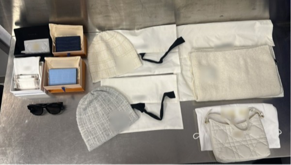 A traveller at Changi Airport was caught for not declaring assorted luxury goods purchased overseas, with the total value exceeding his GST import relief. [Photo- Singapore Customs]