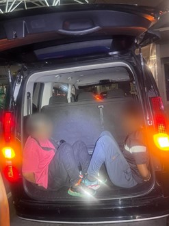 Two Malaysian men, aged 30 and 31, found hiding in the car boot