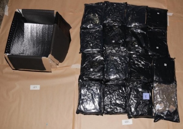 Packets of cannabis seized from one of the boxes within the container on 3 January 2026 (Photo by CNB)